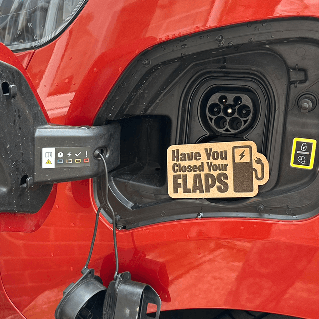 Close your flaps plaque for ev drivers 
