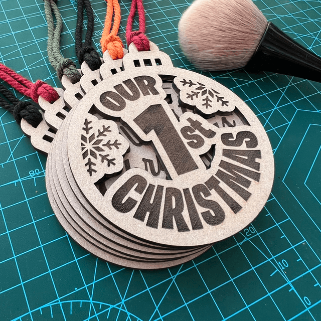 Wooden laser cut and hand finished “Our 1st Christmas” Bauble 